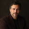 Client headshot: a man in his forties, business owner