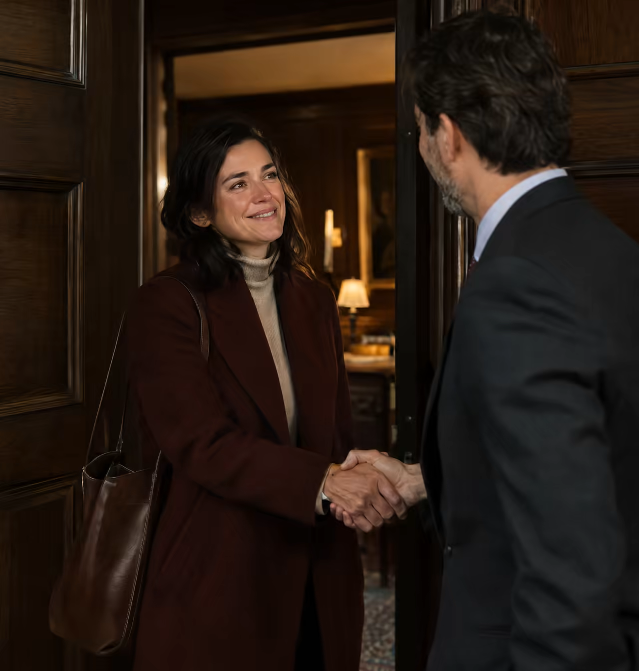 Step 5 Resolution: a client and partner shaking hands in a doorway, relieved